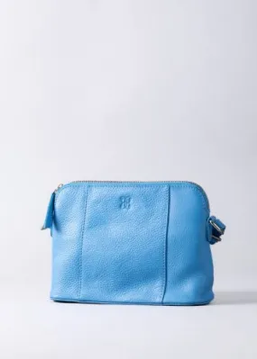 Alston Curved Leather Cross Body Bag in Blue