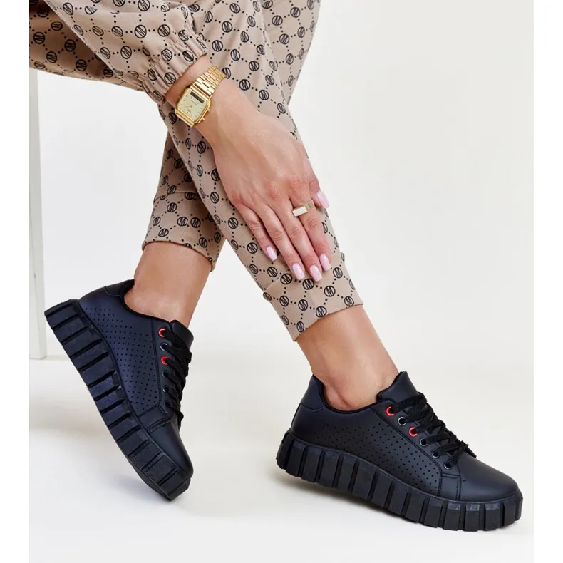 Black sneakers with a massive Nesibe sole