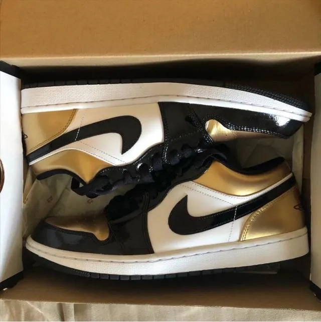 Nike jordan 1 low gold toe